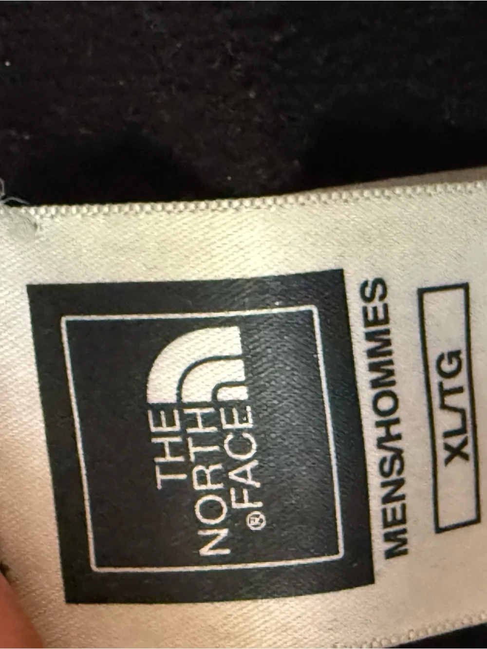 The North Face Black Jacket with Red Logo Patch